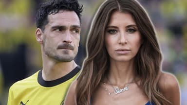 Cathy Hummels guckt ernst in die Kamera, hinter ihr steht Mats Hummels mit traurigem Blick