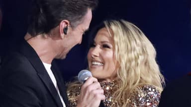 Florian Silbereisen und Helene Fischer lächeln sich an