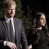 Prinz Harry und Herzogin Meghan gucken beide ernst