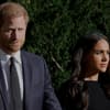 Prinz Harry und Herzogin Meghan gehen Hand in Hand.