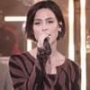 Lena Meyer-Landrut singt am Mikrofon