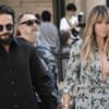 Tom Kaulitz und Heidi Klum sehen zu Boden