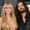 Heidi Klum und Tom Kaulitz posieren zusammen vor den Fotografen