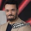 Giovanni Zarrella kneift Lippen zusammen, vor ihm das "The Voice of Germany"-Logo