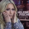 Helene Fischer sieht traurig aus, im Hintergrund die Bühne ihrer "Helene Fischer Show"