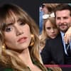 Suki Waterhouse traurig - im Hintergrund kuschelnd mit Bradley Cooper