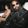 Bianca Censori und Kanye West mit Sonnenbrille im Auto