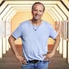 Schauspieler Jochen Horst lächelt bei "Promi Big Brother"