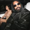 Bianca Censori und Kanye West mit Sonnenbrille im Auto