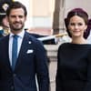 Carl Philip und Sofia lächeln leicht und schauen zur Seite