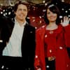 "Tatsächlich ... Liebe": Film-Poster und Hugh Grant und Martine McCutcheon winken