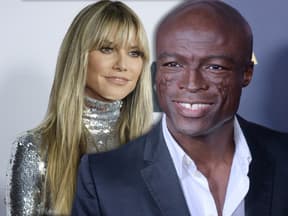 Heidi Klum schaut lächelnd zu Seal