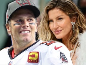 Tom Brady und Gisele Bündchen lächeln