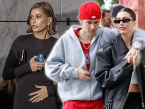 Hailey Bieber hält sich den Bauch und geht Arm in Arm mit Justin Bieber