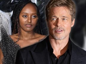 Zahara Jolie-Pitt und Brad Pitt sehen ernst aus