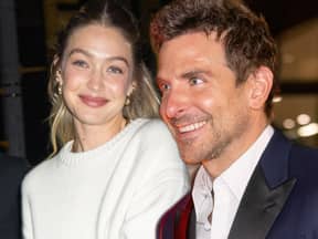 Gigi Hadid und Bradley Cooper lächeln