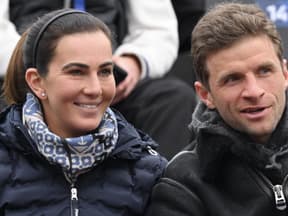 Lisa und Thomas Müller bei einer Sportveranstaltung