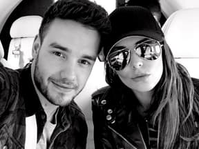 Cheryl Cole und Liam Payne lächeln auf einem gemeinsamen Selfie