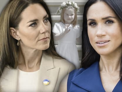 Meghan und Kate schauen ernst drein - im Hintergrund Prinzessin Charlotte im Brautjungfern-Kleid