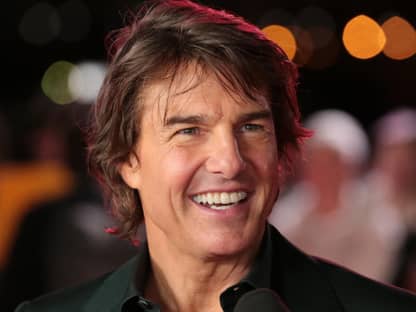 Tom Cruise lacht