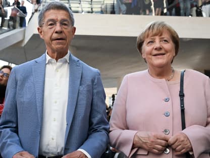 Joachim Sauer und Angela Merkel