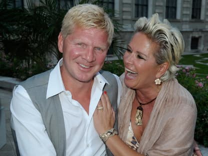 Claudia und Stefan Effenberg lachen.