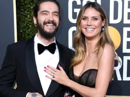 Heidi Klum und Tom Kaulitz lachen glücklich 