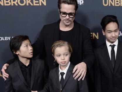 Brad Pitt mit seinen Kindern Pax, Maddox und Shiloh