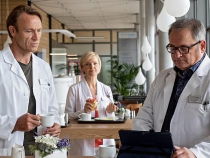 Martin Stein, Kathrin Globisch und Hans Peter Brenner in der Kantine.