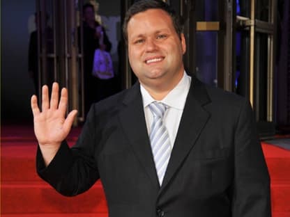 Paul Potts winkt in die Kameras