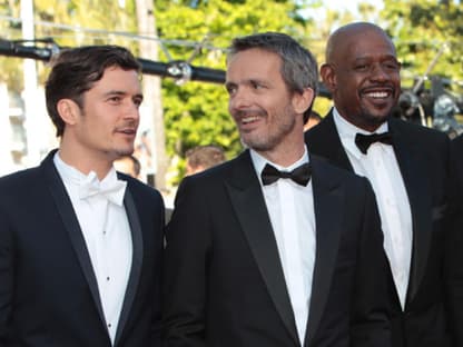 Orlando Bloom, Jerome Salle und Forest Whitaker bei der Premiere des Films "Zulu"