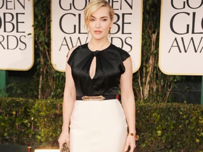 Kate Winslet in einer Robe von Jenny Packham