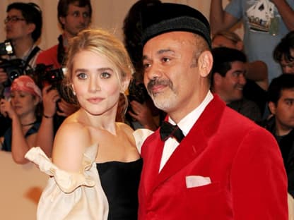 Schuh-Designer Christian Louboutin mit Schauspielerin und Designerin Ashley Olsen