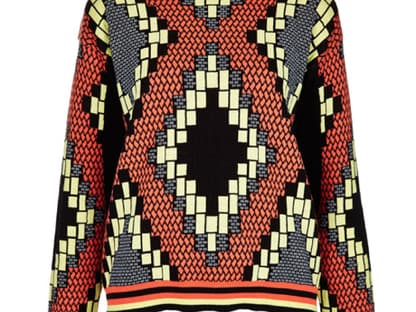 Auch bei schlechtem Wetter muss man auf den Trend nicht verzichten. Strickpullover über topshop.com, ca. 55 Euro