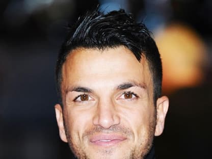 Der frisch geschiedene Sänger Peter Andre kam gut gelaunt ins "Odeon"-Kino nach London