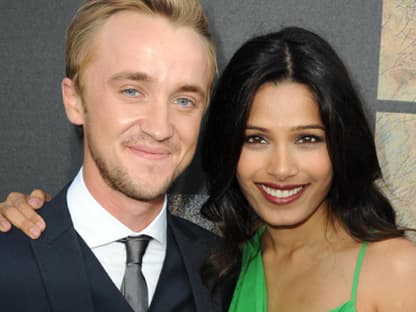 Tom Felton mit Freida Pinto