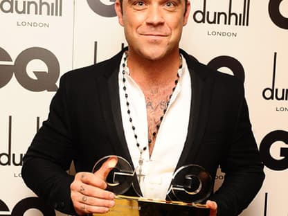 Stolzer Preisträger: Robbie Williams mit seiner Trophäe