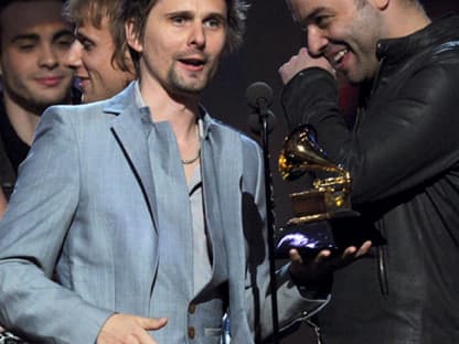 Freuten sich über eine Auszeichnung für das "beste Rock-Album": Matt Bellamy mit seiner Band "Muse"