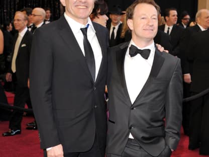 Simon Beaufoy posiert mit Danny Boyle ﻿auf dem Roten Teppich