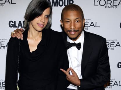 Pharrell Williams mit Begleitung